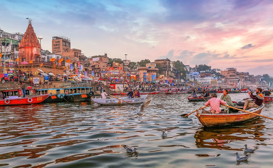 Varanasi-India-January-232019-Dashaswamedh-Ganges-river-ghat-Varanasi-at-twilight-with-tourists-enjoying-boating-rides.jpg